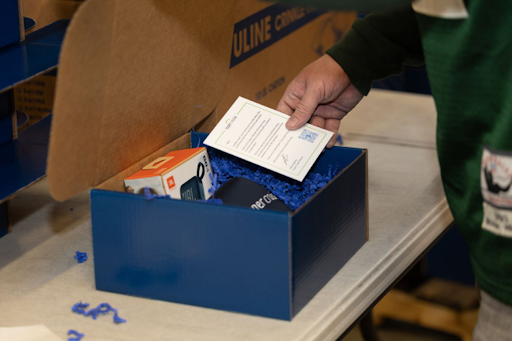 open blue kitting box for onstar corporate kitting project