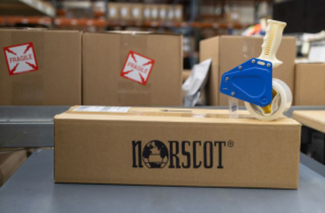 A package containing a Norscot corporate kitting project